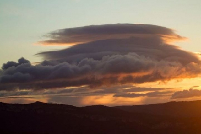  clouds above a mountain 